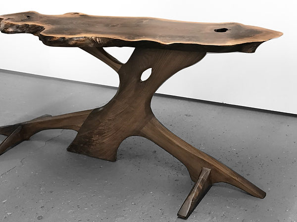 Live edge walnut console with root-like base