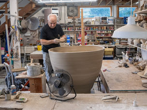 Paul Chaleff working in a monumental clay vessel