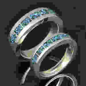 Turquoise wedding ring set handcrafted in sterling silver by Hileman.