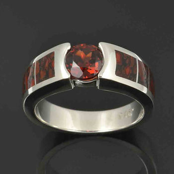 Dinosaur bone ring with red garnet in sterling silver.