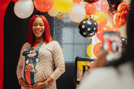 A pregnant women at a baby shower
