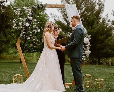 Bride, Groom and Officiant at Wedding Ceremony