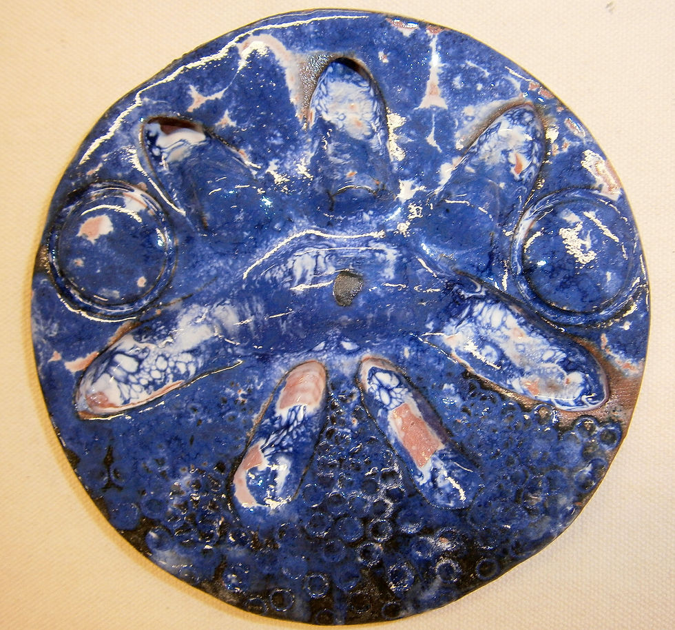Glazed and fired ceramic clay tile
