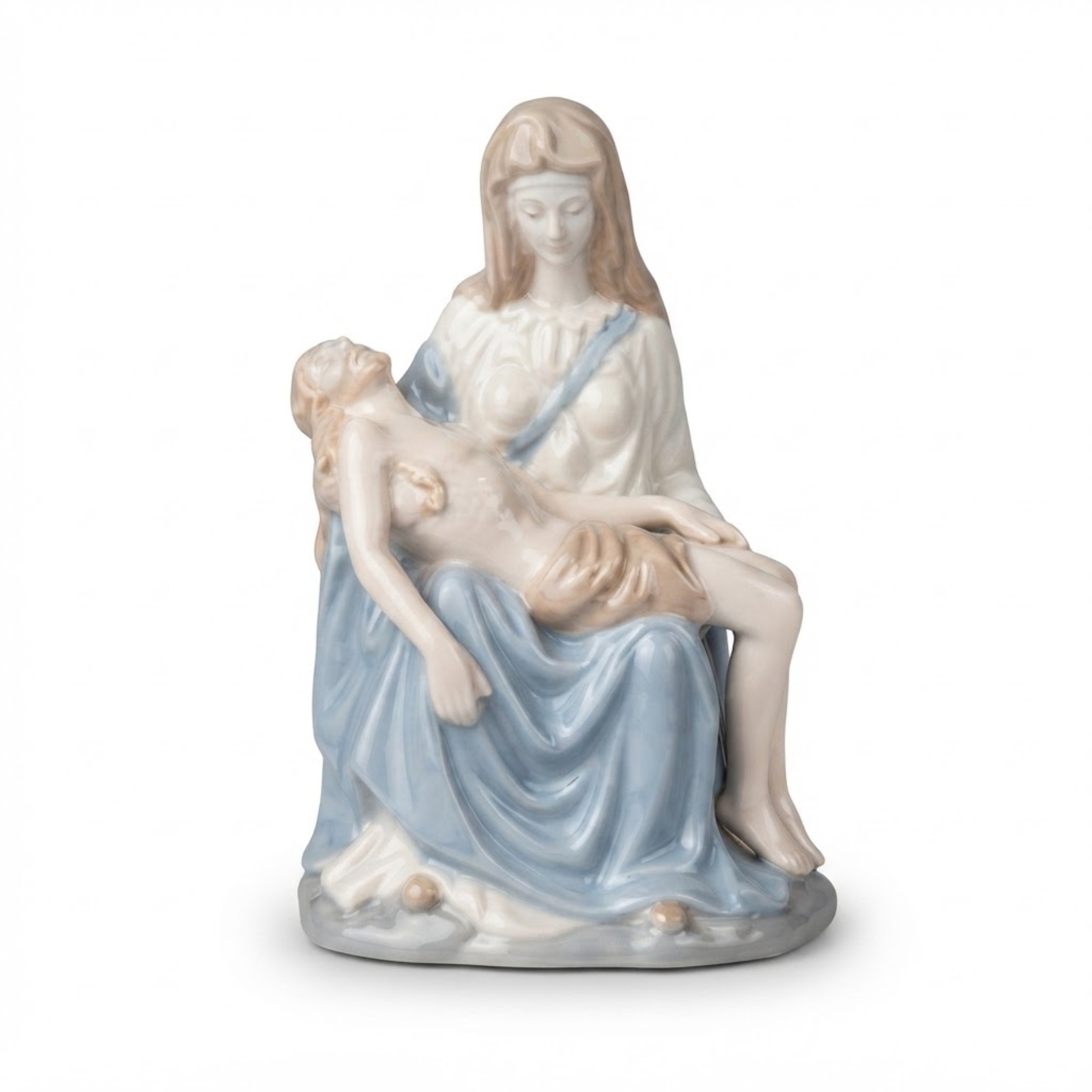 Escultura Pietá em porcelana com tamanho de 19 x 13 cm.