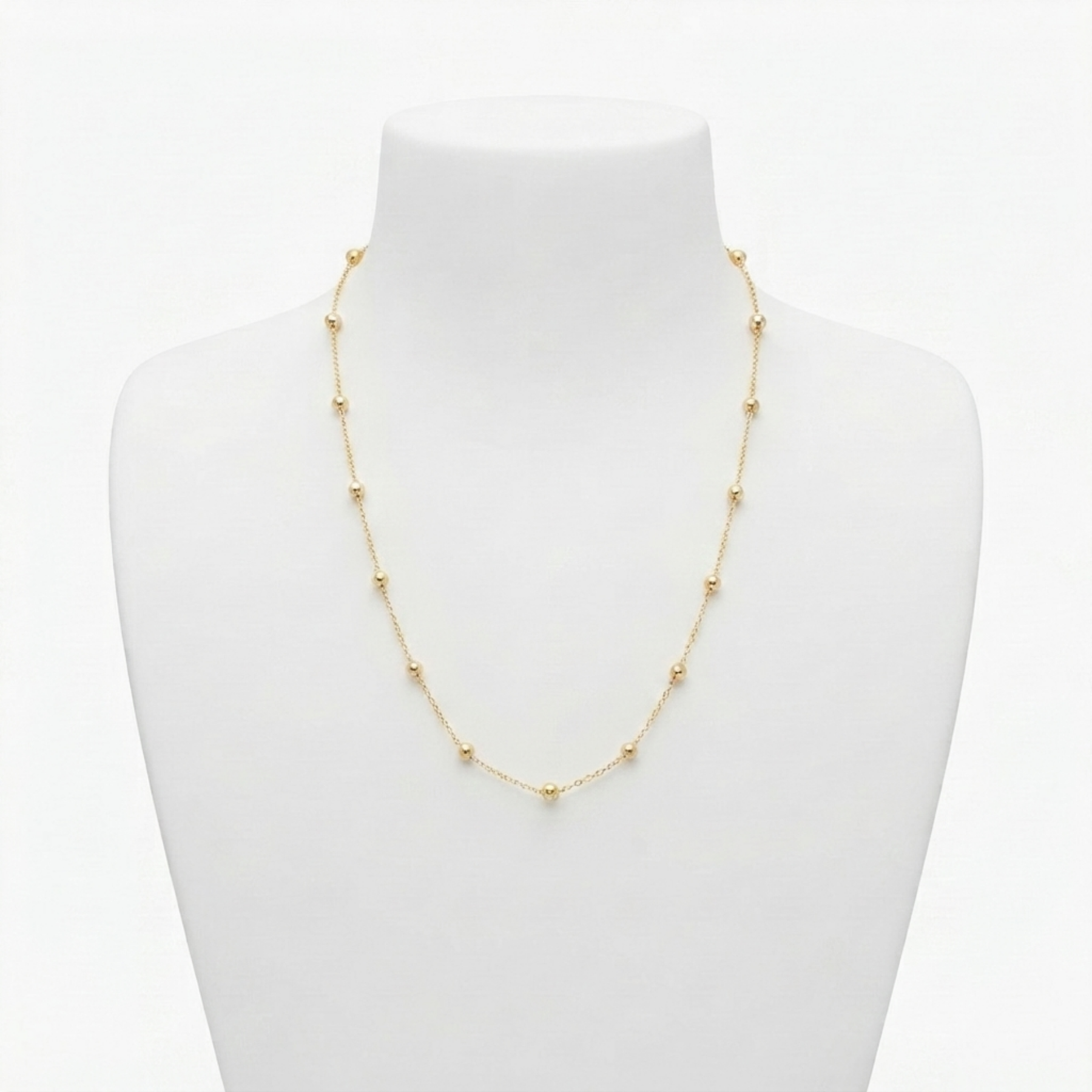 Colar Dots P em metal com 34 cm de comprimento e extensor.