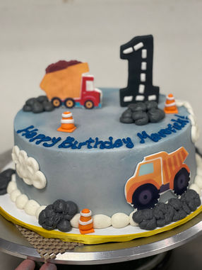 1st birthday cake with trucks