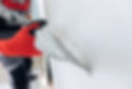 Master working with plasters on white walls and putty screeds after installing drywall..jp