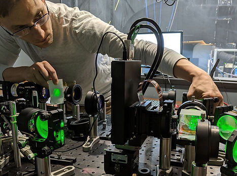 Andrew on the optical bench, WSJ publication