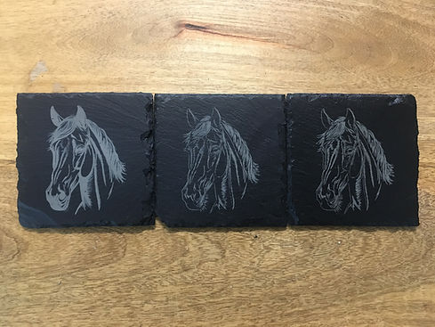 Slate coasters engraved with image of horse