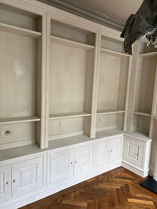 Newly painted built-in shelving unit