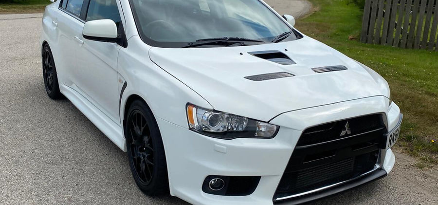 a White Mitsubishi