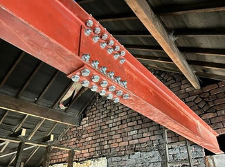 Reinforced steel girder used in construction