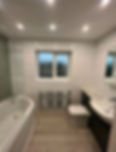 New bathroom with fully tiled walls