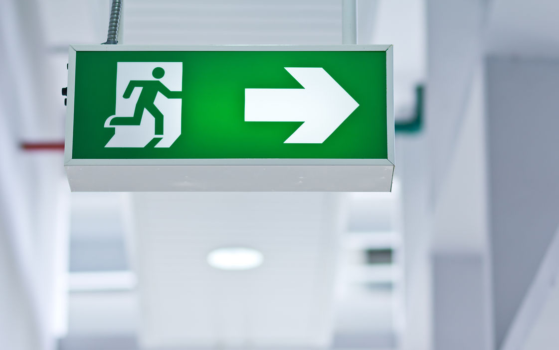 Fire exit sign in a modern building