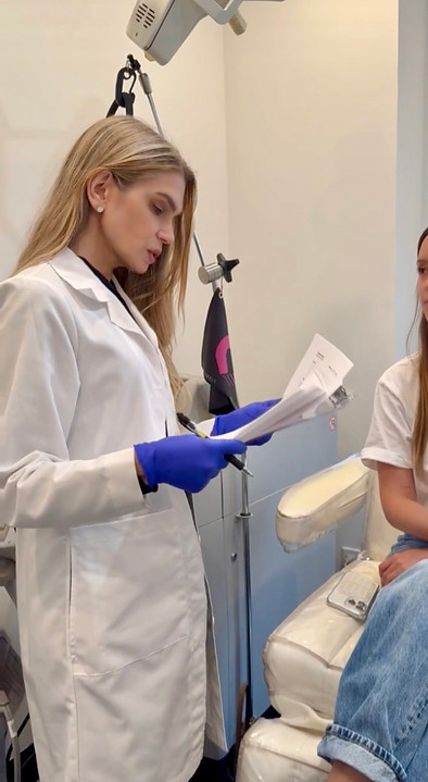 Dr Alexiades Practicing Medicine