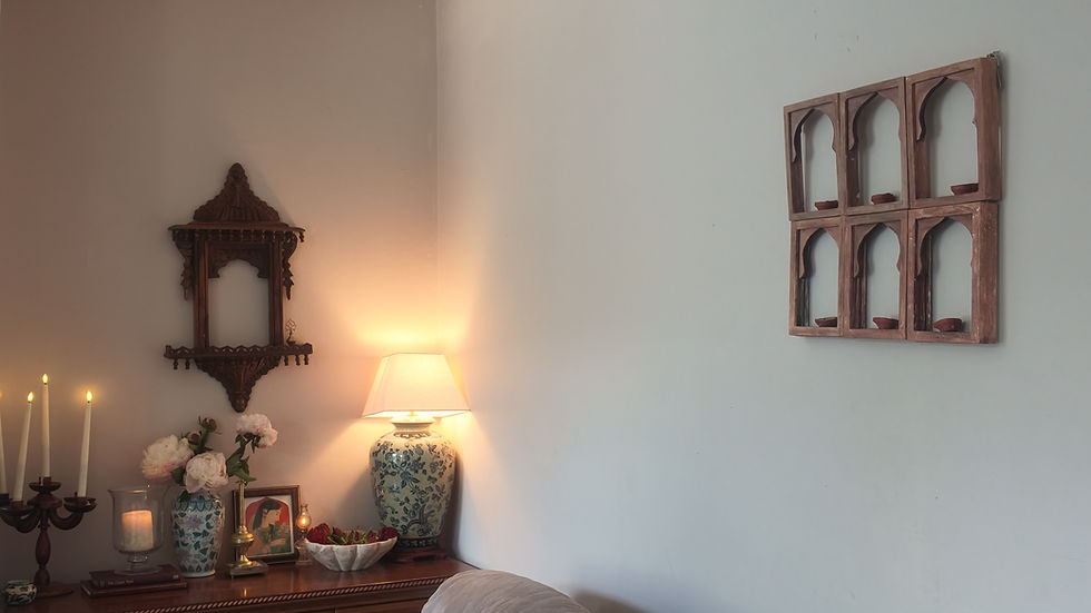 South Asian interior design with carved jharokha wall decor