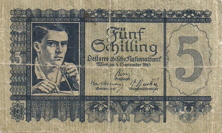 5 Schilling vom 4. September 1945 - Farbvariante schwarzblau. Der Schein zeigt deutlich die schlechte Papierqualität, die Druckfarbe der Hauptplatte bricht in den Knickfalten.