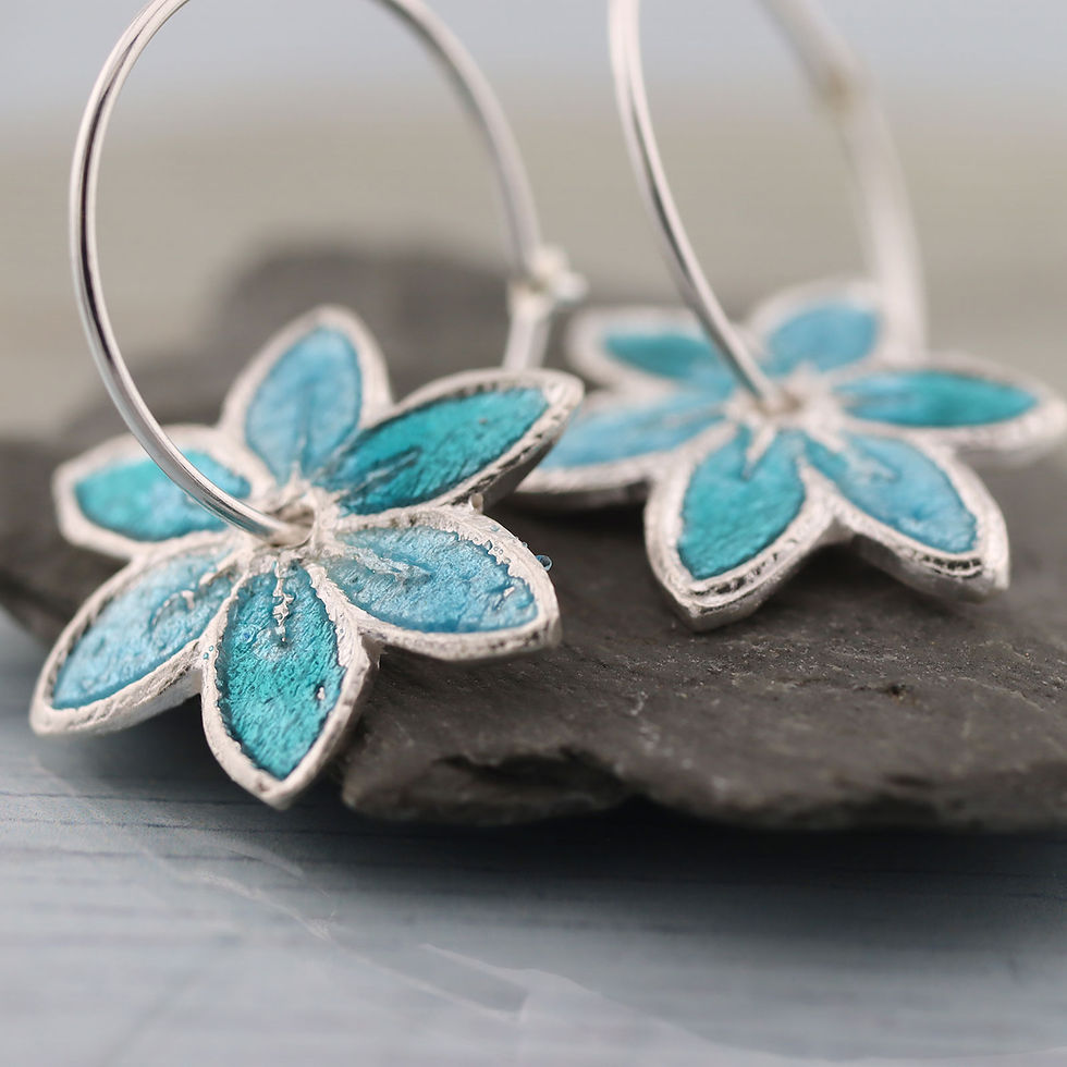 Thumbnail: Silver spinning Flower Earrings