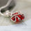 Thumbnail: Fire Red CZ entwined in Silver - Single Gem Necklace