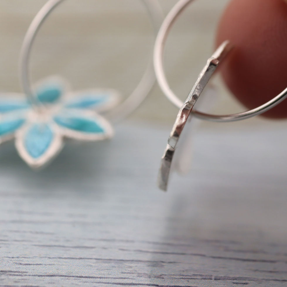 Thumbnail: Silver spinning Flower Earrings