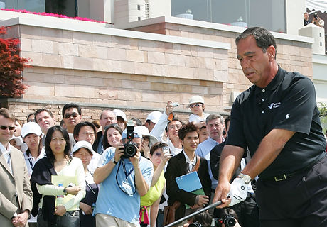 Mike standing on chair Asian Open.jpeg