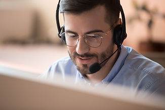 Focused businessman telemarketer telesales agent wear wireless headset make conference vid