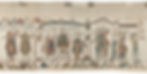 Medieval Bayeux Tapestry depicting figures in royal ceremony. A crowned figure is seated with attendants. Text in Latin above. Intricate patterns.