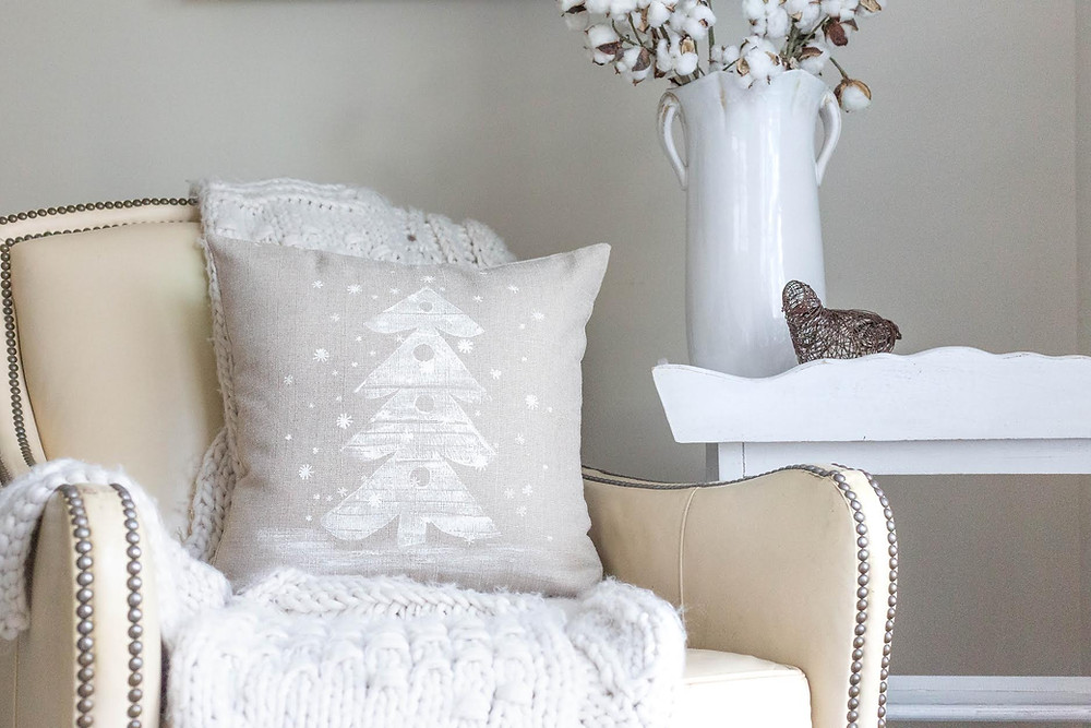 Some people embellished the pillows. This pillow was embellished with embroidery using a french knot to make "snow".