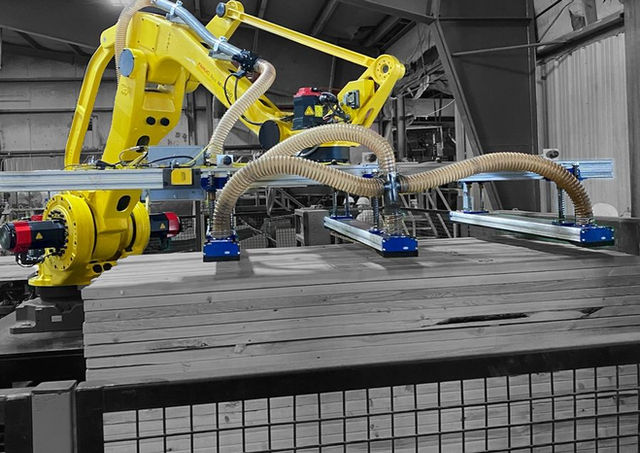 Préhenseur robot équipé de caissons d'aspiration