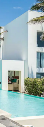 Nestled on a breathtaking stretch of white sand beach, this resort features 362 rooms and suites designed to harmonize with the surrounding natural landscape. Guests can enjoy a relaxed and welcoming atmosphere while taking in stunning views of the Caribbean Sea and lush green jungles.