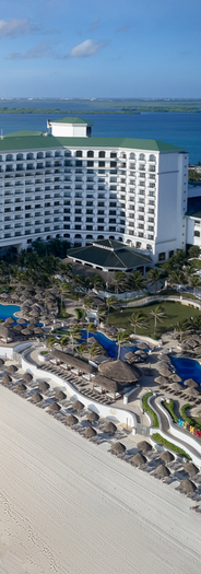 This luxurious beach resort, located in Cancun's tourist zone, blends modern design with natural beauty. Featuring 451 rooms spread over 12 levels, the resort offers panoramic views of Ballenas Beach and the Caribbean Ocean, alongside first-class amenities like a Mayan-inspired spa, dazzling pools, and gourmet dining experiences. Perfect for leisure and business travelers, the hotel combines relaxation with extensive convention facilities.