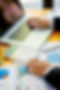 close-up-business-using-calculator-laptop-doing-math-finance-report-wooden-desk-tax-accoun