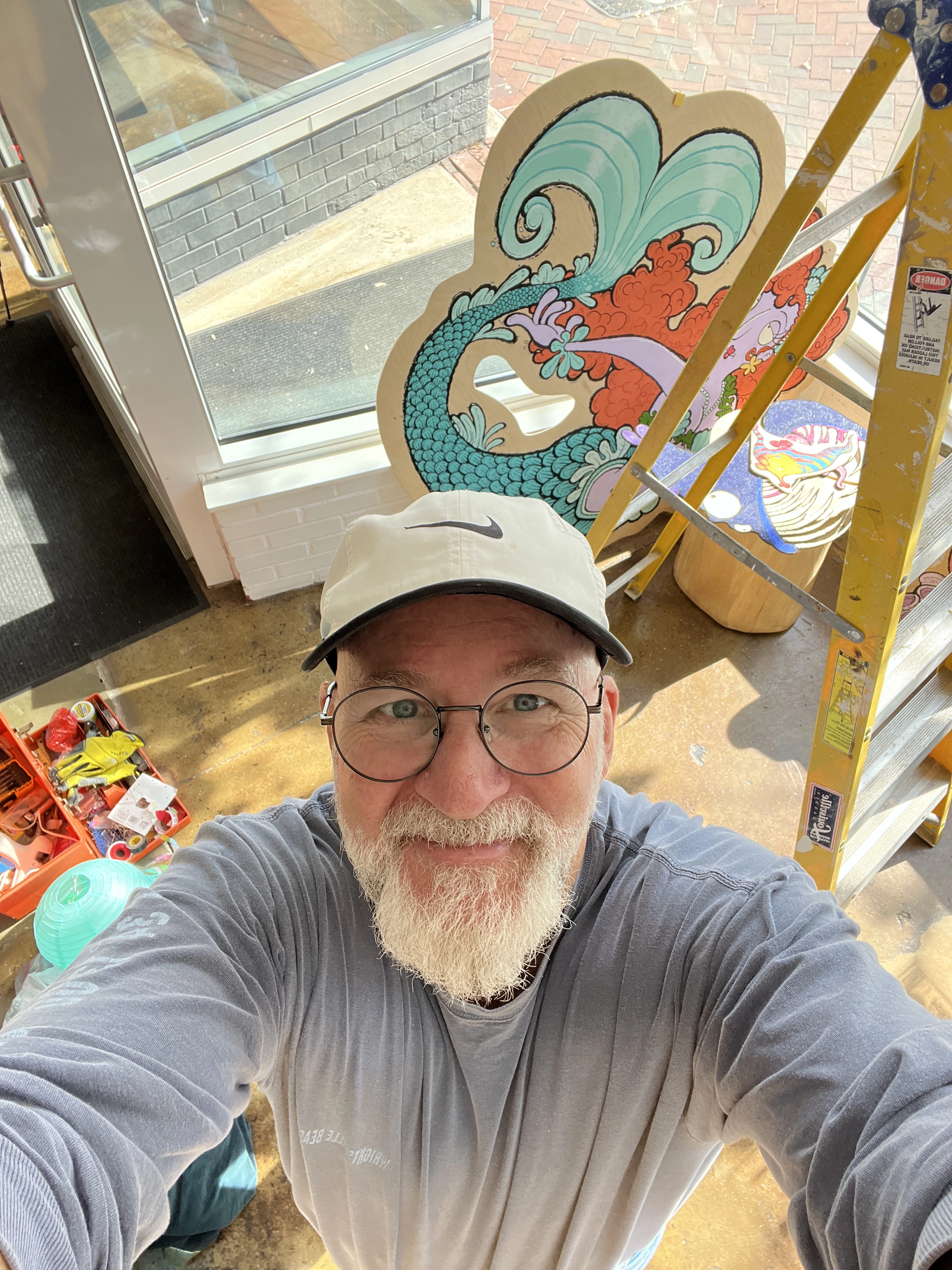 self portrait installing weird windows art display