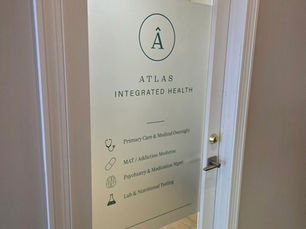 Custom Frosted Glass Window Graphics for Atlas Integrated Health | Office Branding in McHenry County