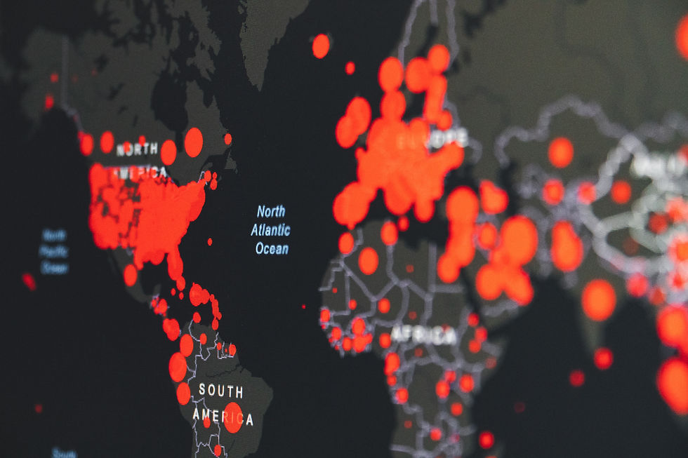 A world map with orange dots indicating the spread of a pandemic.