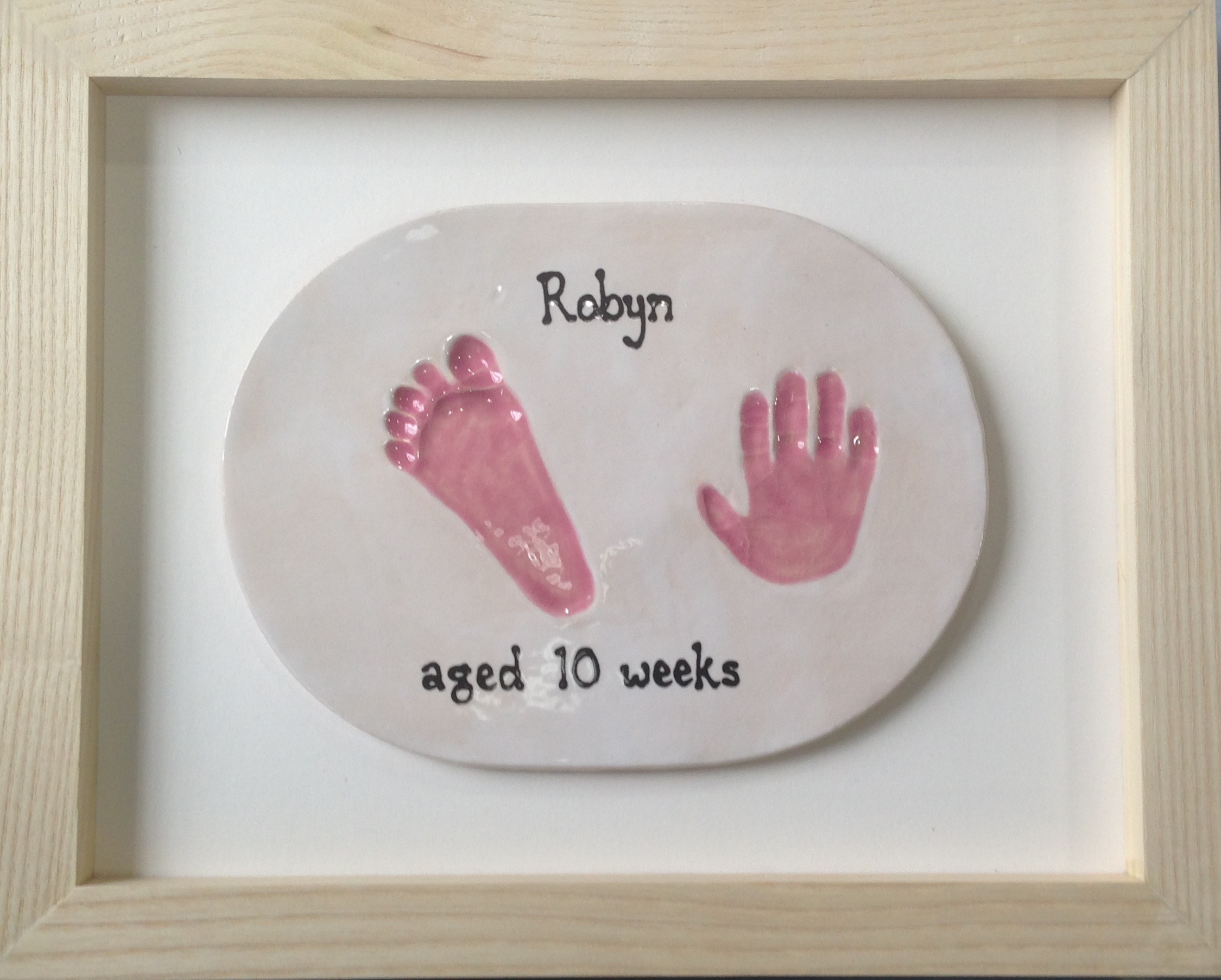 Framed baby hand and footprint