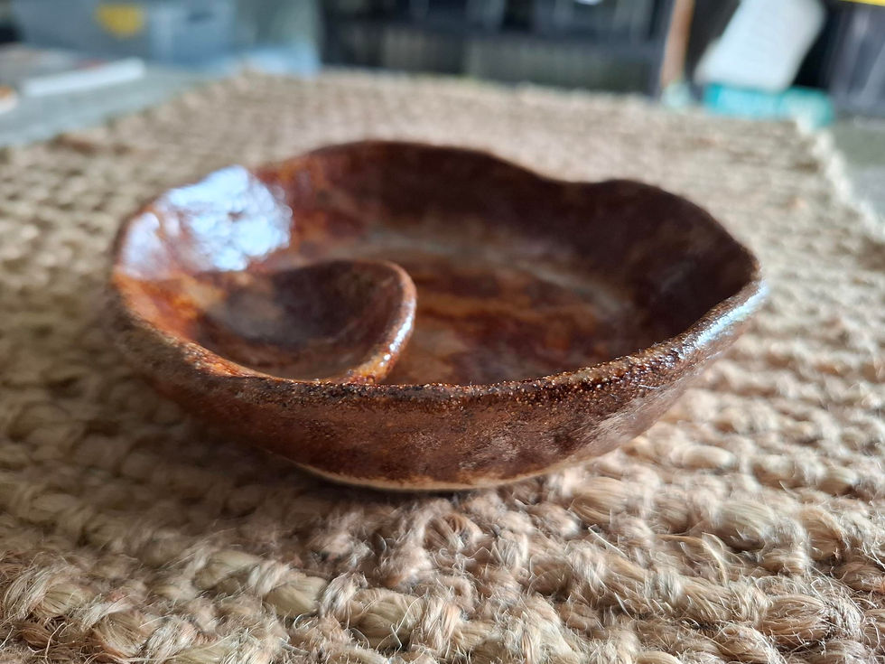 Thumbnail: Textured and glazed ceramic olive and pit bowl