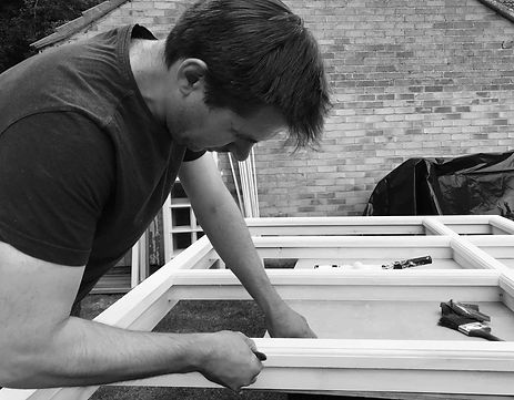 Robert Forster working on a new sash window for a client