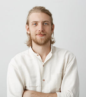 portrait-positive-handsome-blond-man-with-beard-moustache-standing-with-crossed-hands-whit