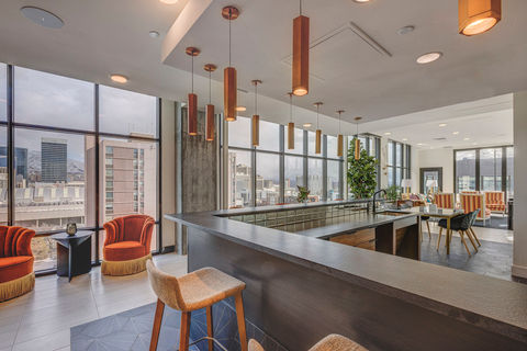 Indoor common area that overlooks skyline.