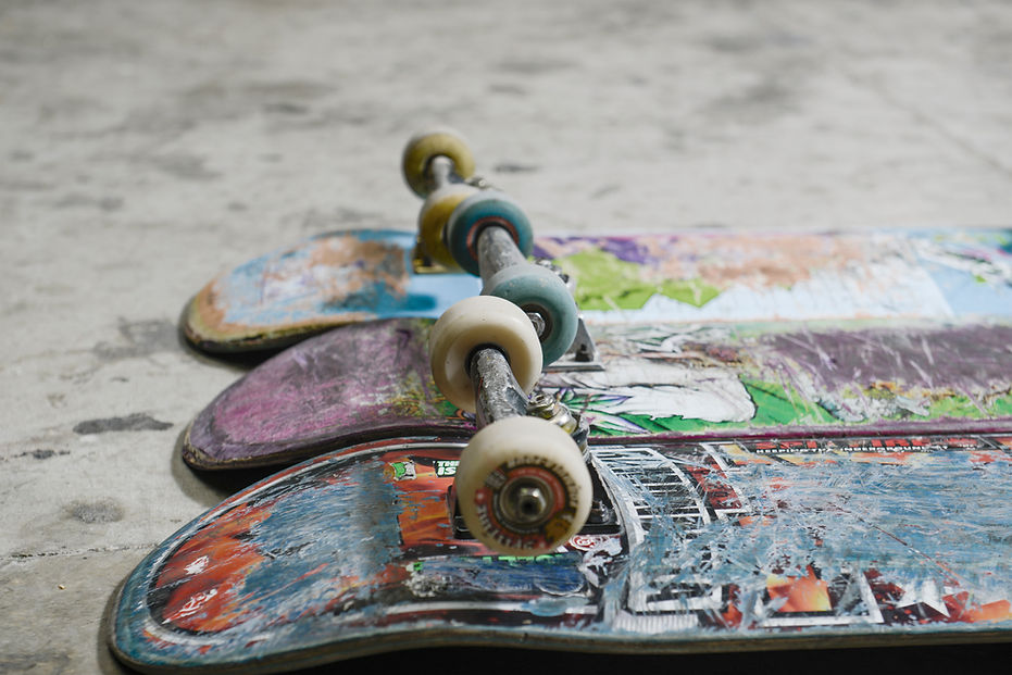 Worn Skateboards On Concrete