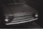 Front of a 1962 vintage car, black and white