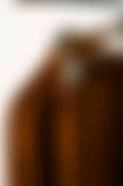 Amber pajama set hanging on a rack.