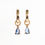 Thumbnail: Gold hoop earring with a dark blue set gemstone charm.