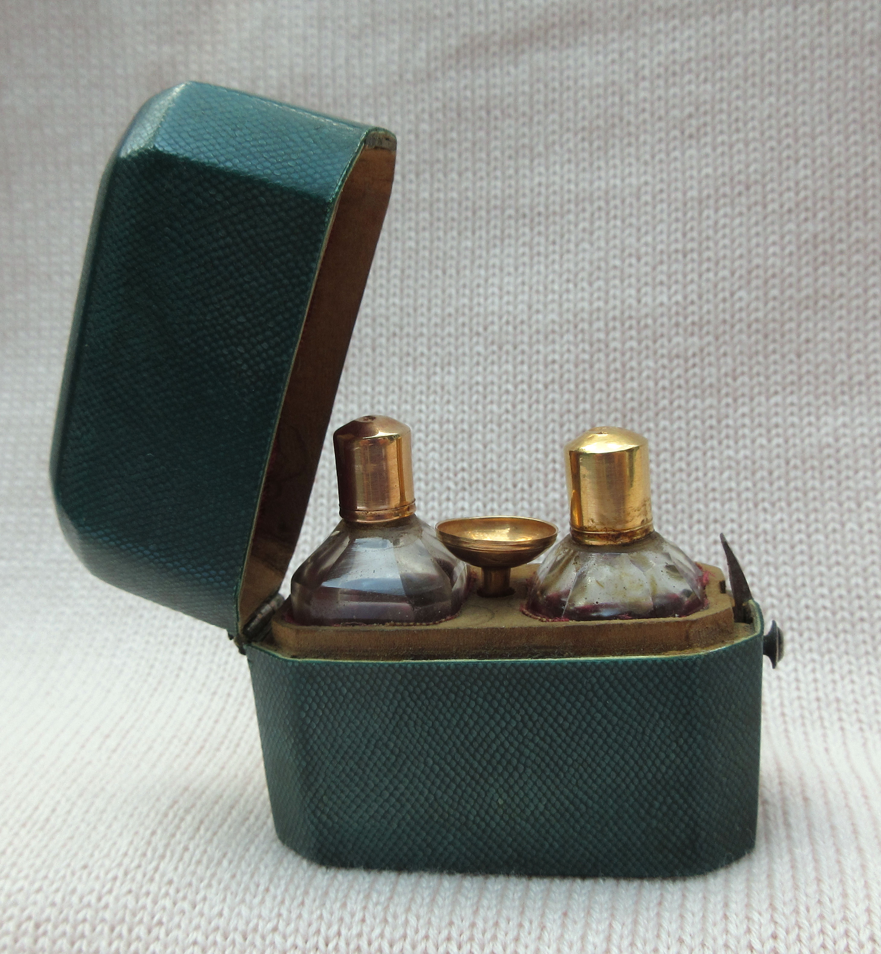 Gold top scent bottles and gold scent funnel