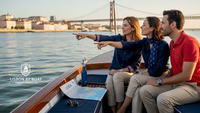 Lisbon boat tour group enjoying river view