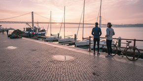 Lisbon marina with boats and sunrise view