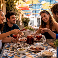 Group sharing traditional Portuguese petiscos dishes