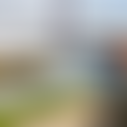 Yellow boat cruising Tagus River in Lisbon