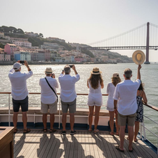 Tourists on boat viewing Lisbon river skyline